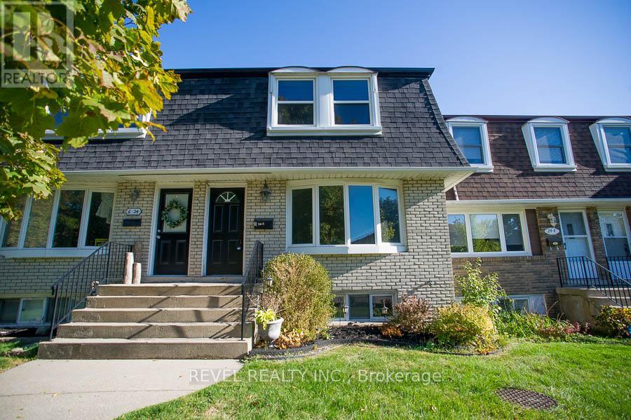 5 - 24 Coachwood Road, Brantford, Ontario  N3R 3R4 - Photo 2 - X12461163