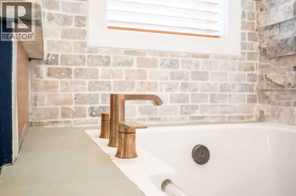 18 Cimarron Grove Bay, Okotoks, Alberta  T1S 2H3 - Photo 23 - A2260175