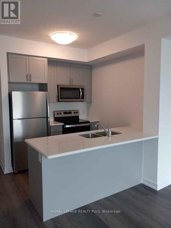 219 - 5055 Greenlane Road, Lincoln, Ontario  L3J 2J3 - Photo 2 - X12461514