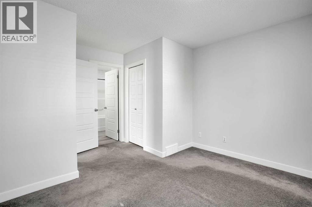 137 Pantego Lane Nw, Calgary, Alberta  T3K 0T1 - Photo 28 - A2262652