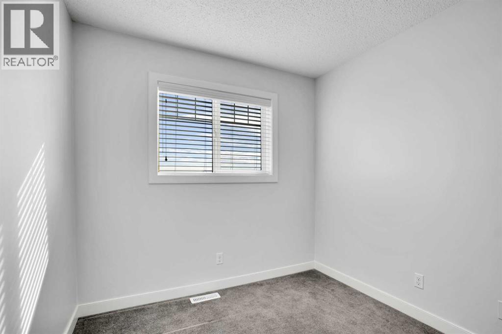 137 Pantego Lane Nw, Calgary, Alberta  T3K 0T1 - Photo 32 - A2262652