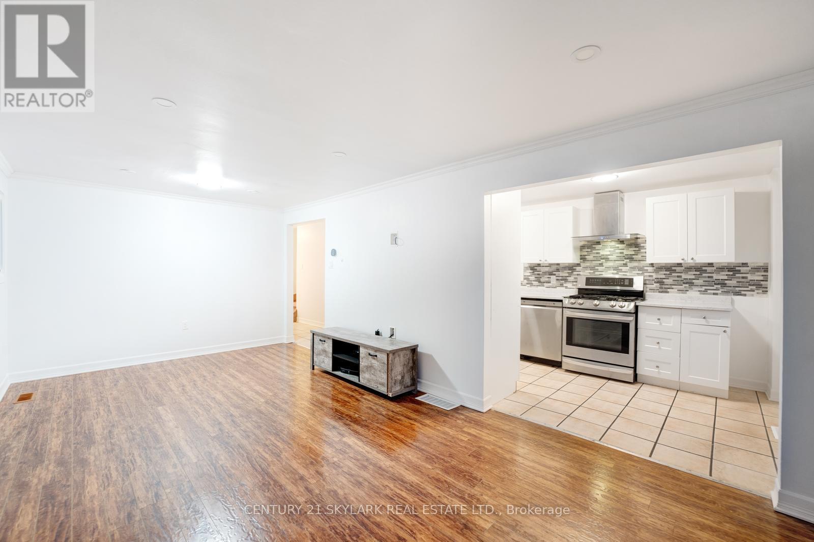 66 Corbett Drive, Barrie, Ontario  L6M 5V3 - Photo 6 - S12461630