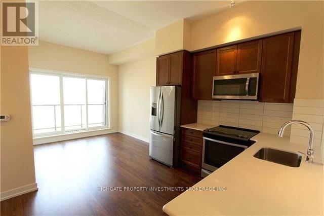 417 - 555 William Graham Drive, Aurora, Ontario  L4G 7C4 - Photo 2 - N12461745