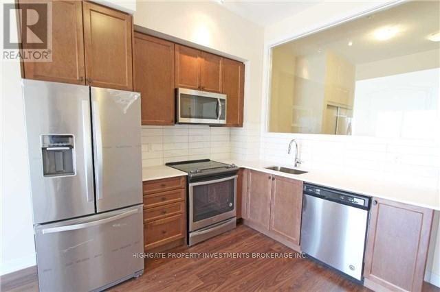417 - 555 William Graham Drive, Aurora, Ontario  L4G 7C4 - Photo 3 - N12461745