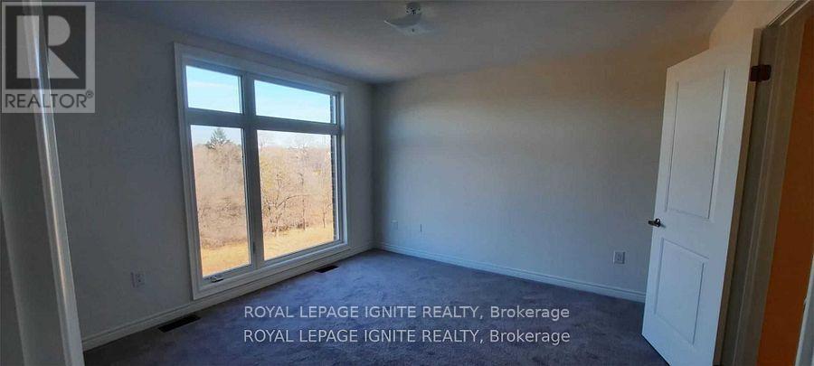 25 Queenpost Drive, Brampton, Ontario  L6Y 6L2 - Photo 5 - W12461786