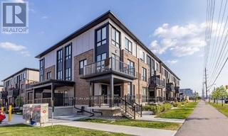 209 - 1200 Main Street E, Milton, Ontario  L9T 8M7 - Photo 2 - W12461848