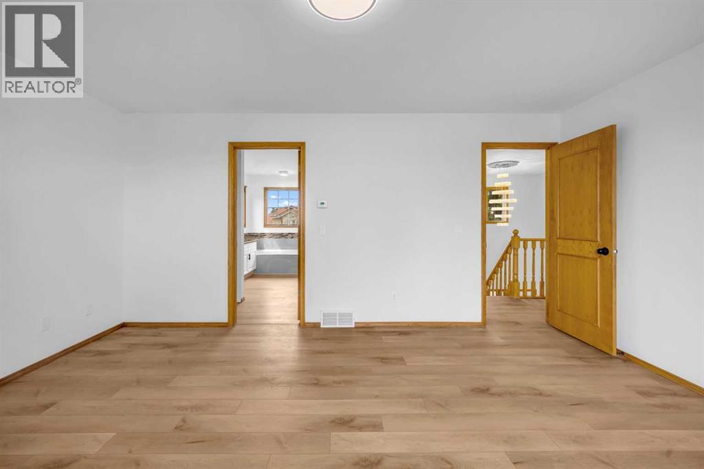 208 Coral Shores Bay Ne, Calgary, Alberta  T3J 3J6 - Photo 31 - A2247303