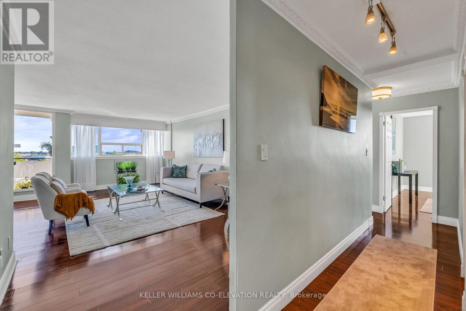 702 - 14 Neilson Drive, Toronto, Ontario  M9C 1V6 - Photo 4 - W12462051