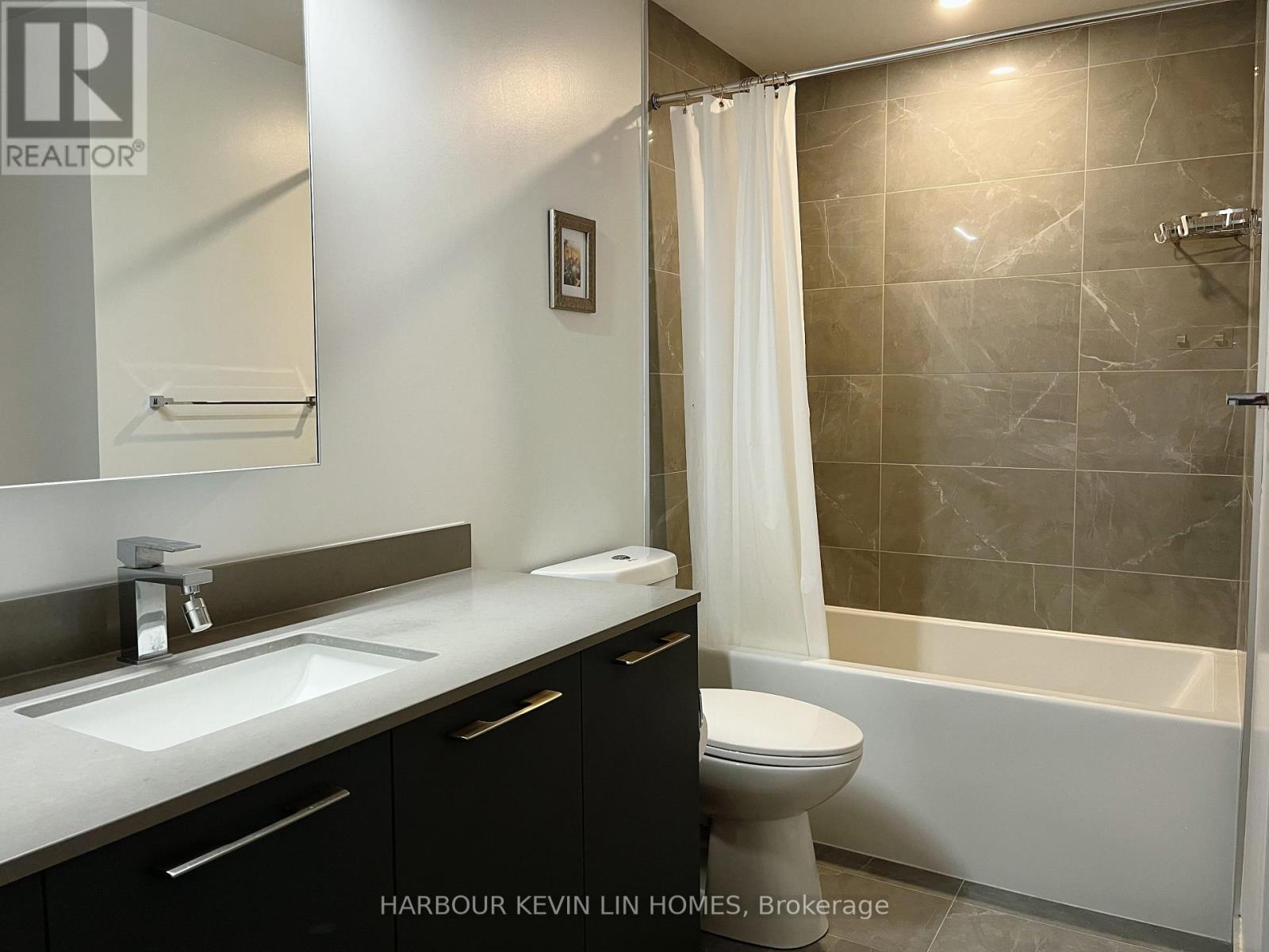 1611 - 8 Water Walk Drive, Markham, Ontario  L3R 6L4 - Photo 10 - N12462186