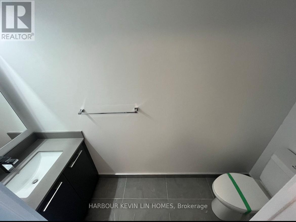 1611 - 8 Water Walk Drive, Markham, Ontario  L3R 6L4 - Photo 4 - N12462186
