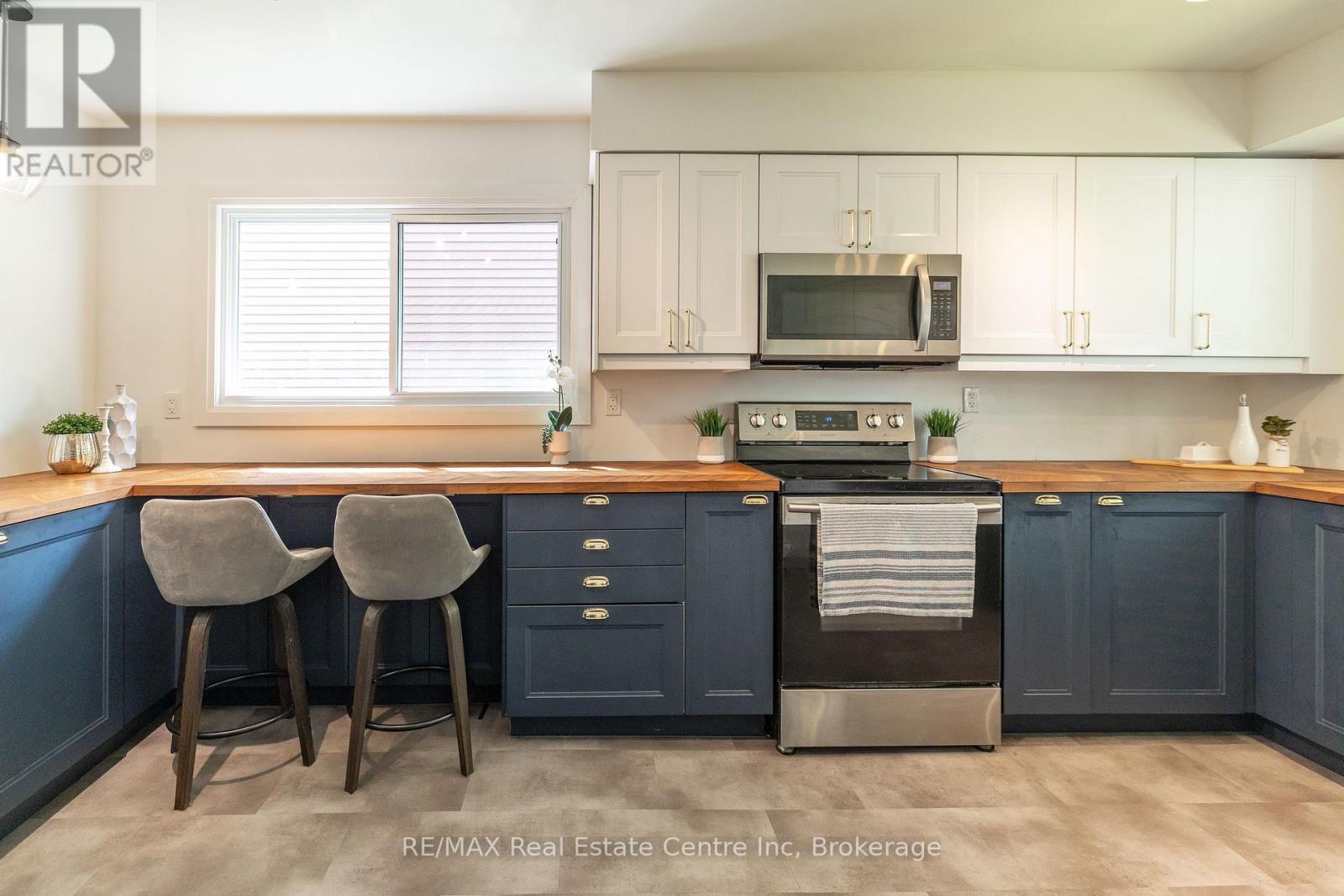 34 Woodridge Drive, Guelph, Ontario  N1H 7E2 - Photo 6 - X12462407