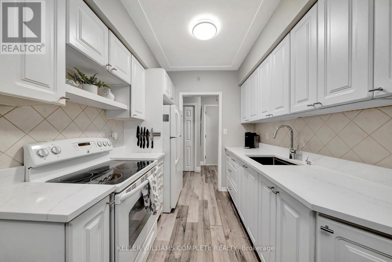 307 - 11 Woodman Drive S, Hamilton, Ontario  L8K 4E3 - Photo 3 - X12462408