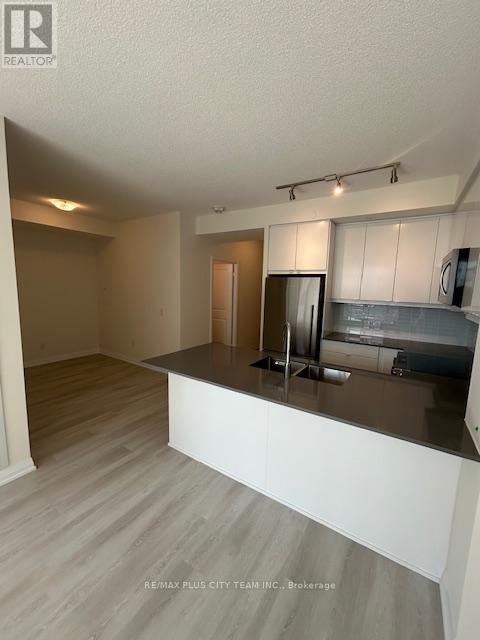 709 - 3260 Sheppard Avenue E, Toronto, Ontario  M1T 3K3 - Photo 4 - E12462773