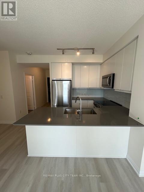709 - 3260 Sheppard Avenue E, Toronto, Ontario  M1T 3K3 - Photo 5 - E12462773