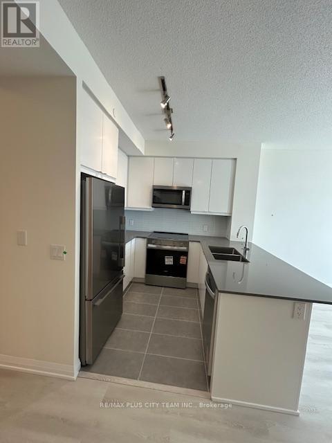 709 - 3260 Sheppard Avenue E, Toronto, Ontario  M1T 3K3 - Photo 7 - E12462773