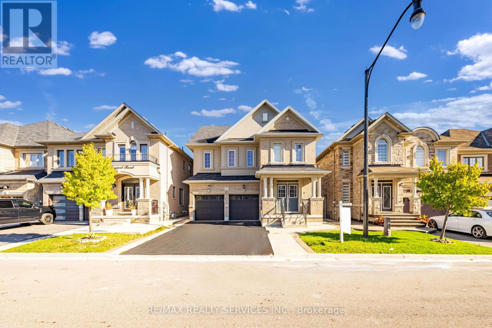 21 Magical Road, Brampton, Ontario  L7A 4P8 - Photo 2 - W12462619