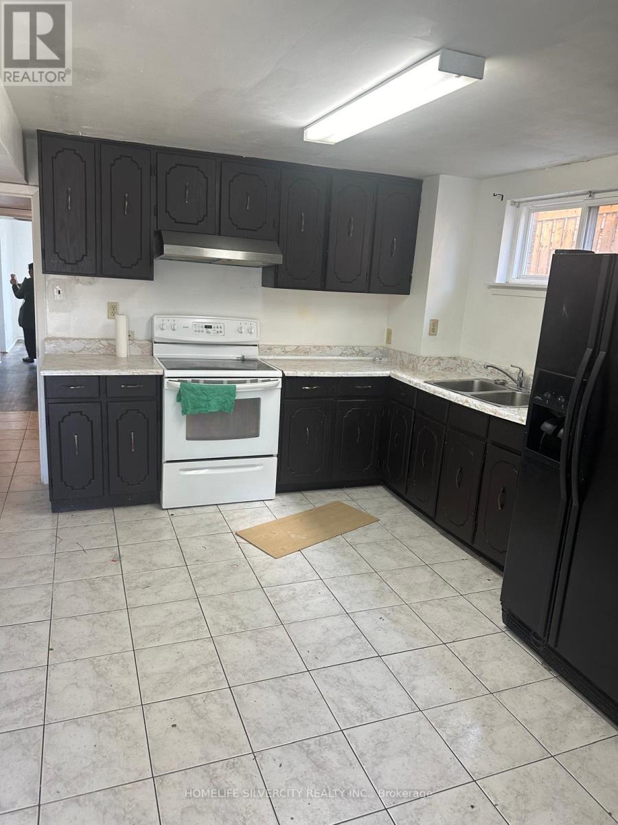 Basement - 31 Lakeland Drive S, Toronto, Ontario  M9V 1M8 - Photo 11 - W12462775