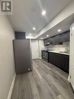 51 Percy Gate, Brampton, Ontario  L7A 3S1 - Photo 5 - W12462816