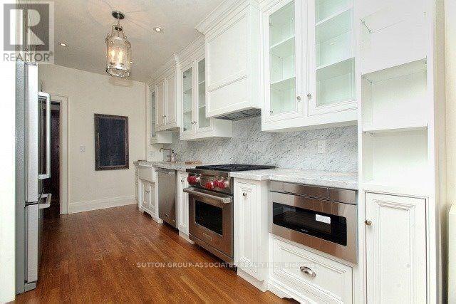 Main - 36 Glenholme Avenue, Toronto, Ontario  M6H 3A9 - Photo 6 - W12462824
