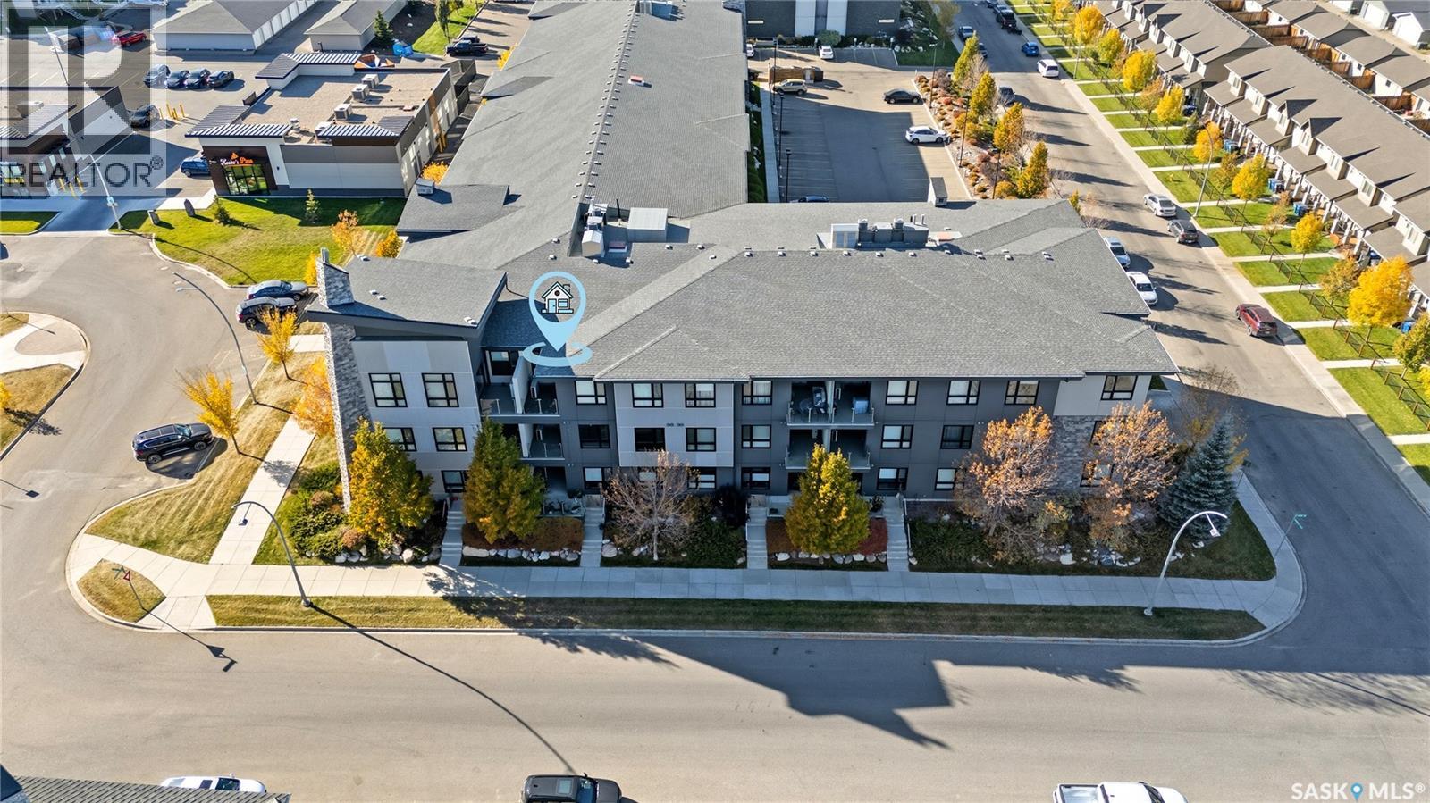 221 235 Evergreen Square, Saskatoon, Saskatchewan  S7W 0T9 - Photo 2 - SK020740