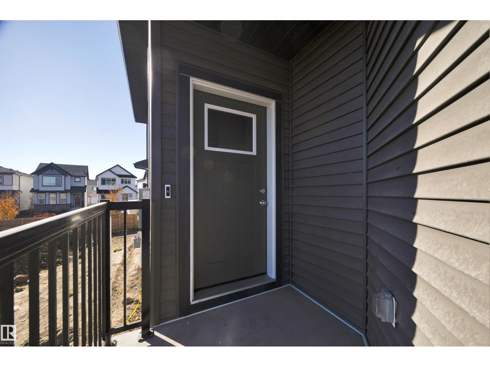 8925 Elves Lo Nw, Edmonton, Alberta  T6M 3G3 - Photo 4 - E4459076
