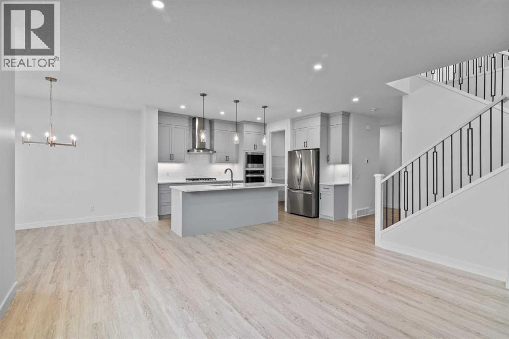 22 Emerson Crescent, Okotoks, Alberta  T1S 5W7 - Photo 9 - A2258763