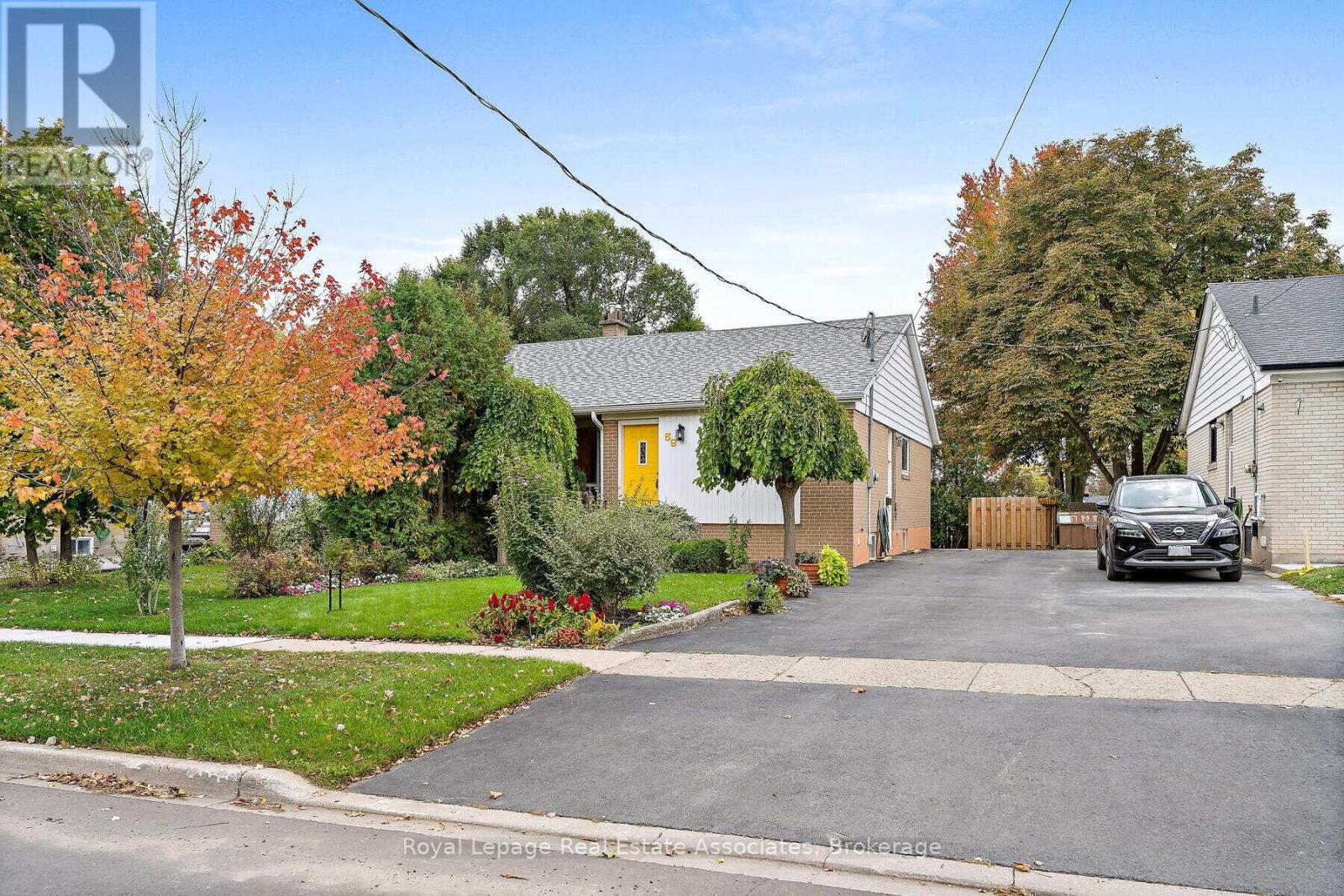 59 Mcintyre Crescent, Halton Hills, Ontario  L7G 1N5 - Photo 1 - W12463106