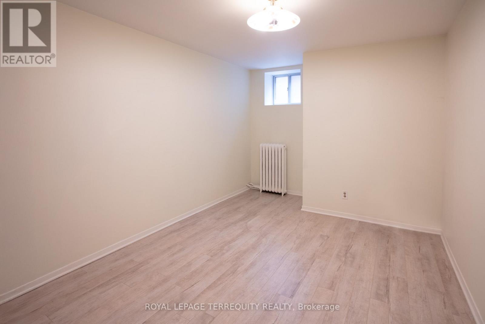 Basement - 10 Northcliffe Boulevard, Toronto, Ontario  M6H 3H1 - Photo 10 - W12463124