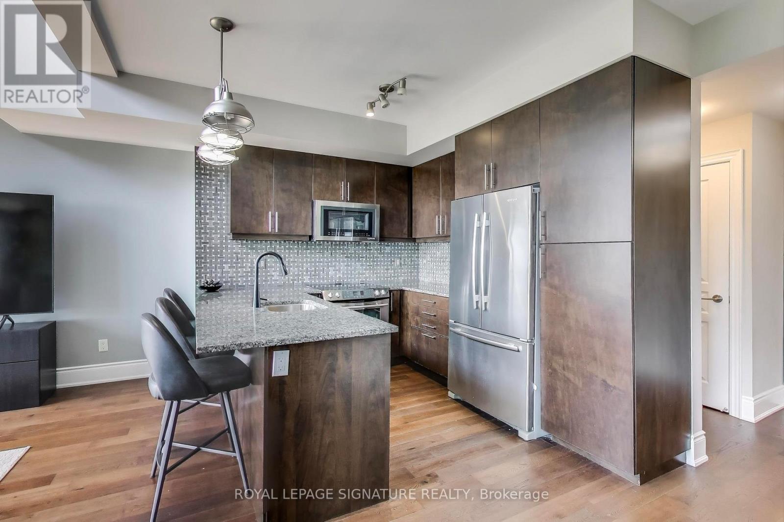 405 - 3170 Erin Mills Parkway, Mississauga, Ontario  L5L 0B6 - Photo 7 - W12463354