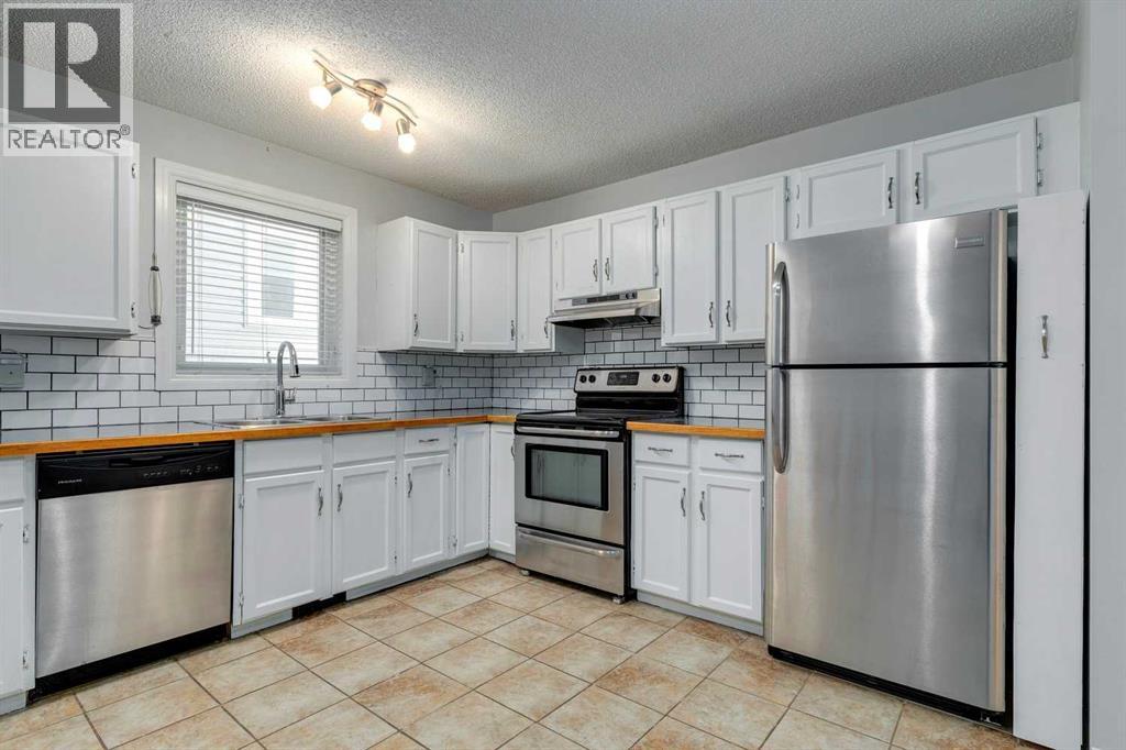 16227 Shawfield Drive Sw, Calgary, Alberta  T2Y 2J7 - Photo 11 - A2263436