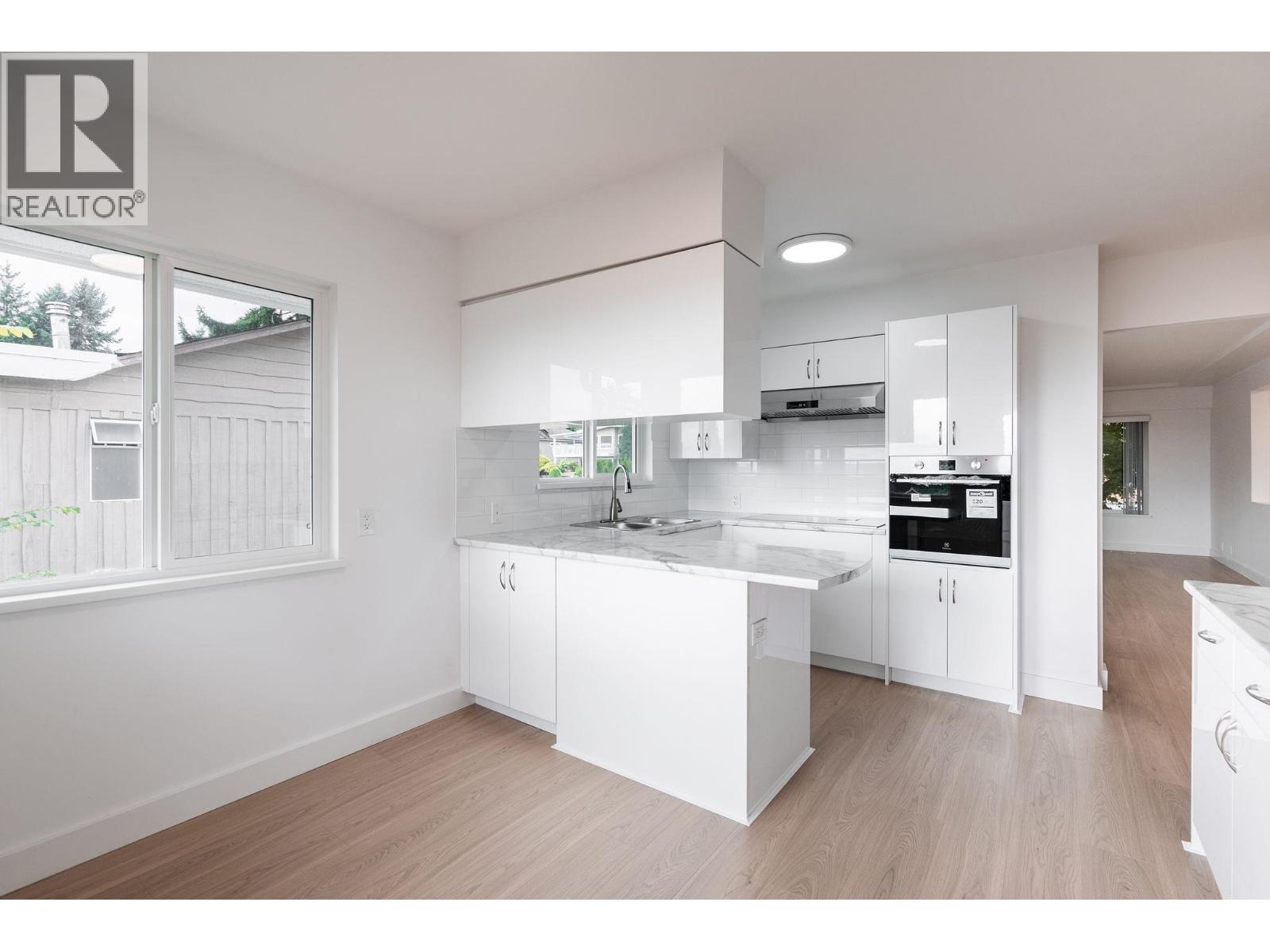 1410 Dansey Avenue, Coquitlam, British Columbia  V3K 3H8 - Photo 9 - R3035020