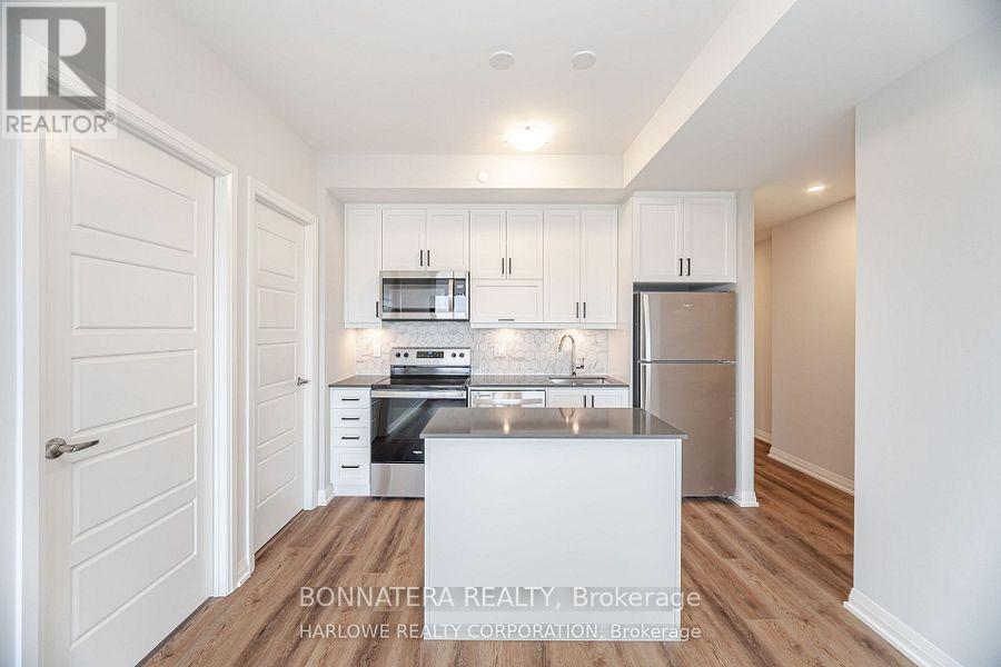 907 - 3006 William Cutmore Boulevard, Oakville, Ontario  L6H 8A4 - Photo 11 - W12463683