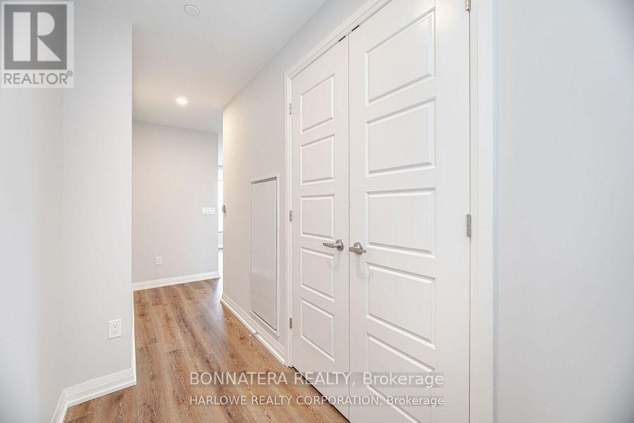 907 - 3006 William Cutmore Boulevard, Oakville, Ontario  L6H 8A4 - Photo 4 - W12463683