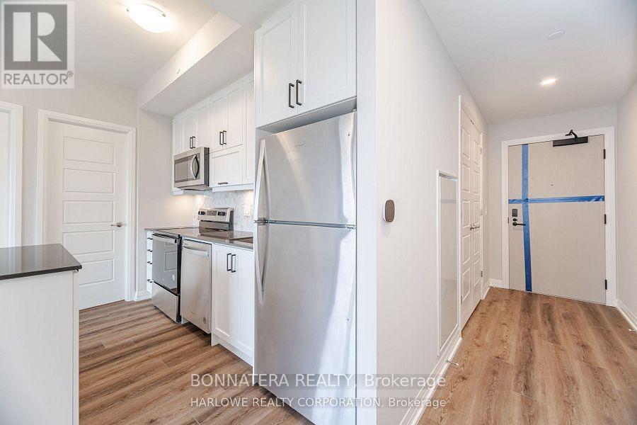907 - 3006 William Cutmore Boulevard, Oakville, Ontario  L6H 8A4 - Photo 7 - W12463683