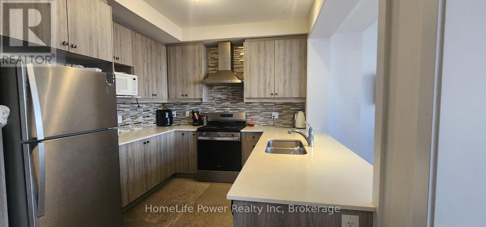 1543 Rose Way, Milton, Ontario  L9T 7E7 - Photo 3 - W12463981