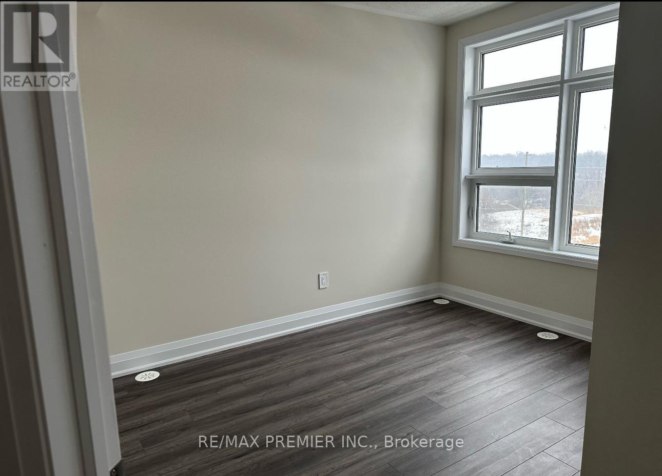 104 - 1581 Rose Way, Milton, Ontario  L9T 7E7 - Photo 4 - W12463803