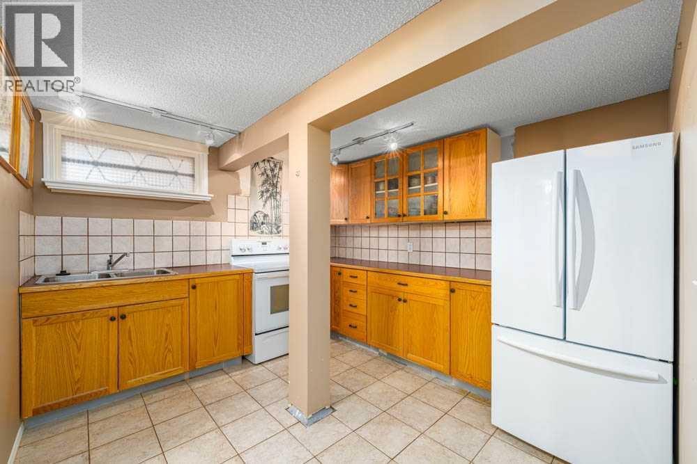 2211 Halifax Crescent Nw, Calgary, Alberta  T2M 4E1 - Photo 18 - A2242702