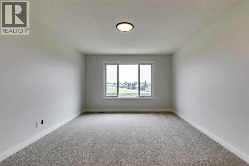 99 Saddlebred Place, Cochrane, Alberta  T4C 3E6 - Photo 34 - A2264758