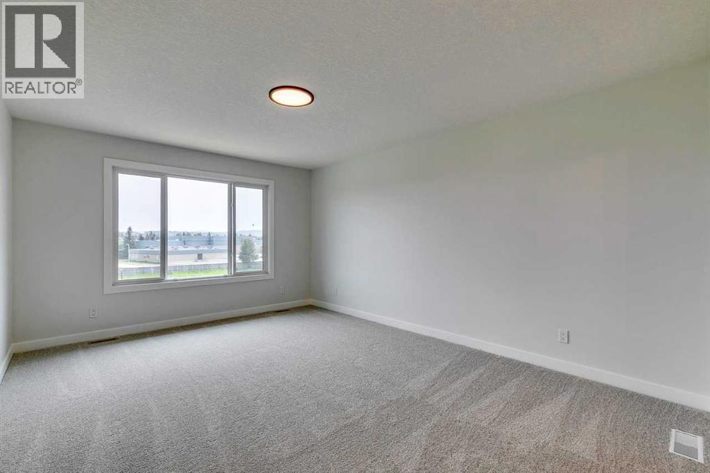 99 Saddlebred Place, Cochrane, Alberta  T4C 3E6 - Photo 40 - A2264758