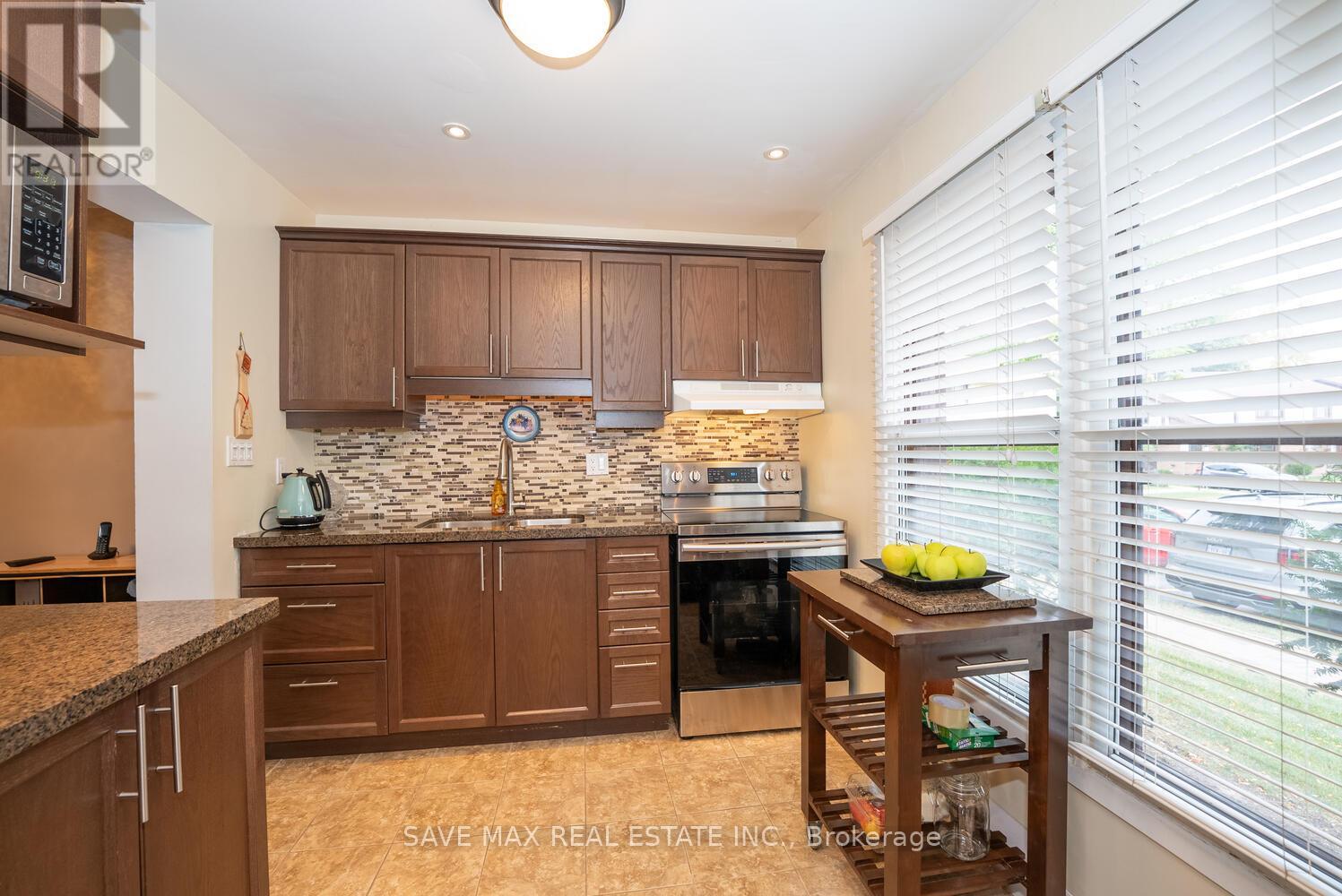 31 - 6650 Falconer Drive, Mississauga, Ontario  L5N 1B5 - Photo 5 - W12464364
