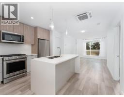 202 128 E 8TH STREET, North Vancouver, British Columbia