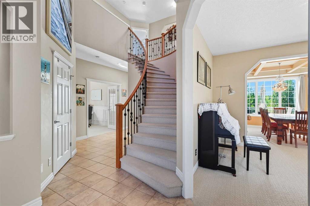 7 Panatella Close Nw, Calgary, Alberta  T3K 6B3 - Photo 5 - A2259686