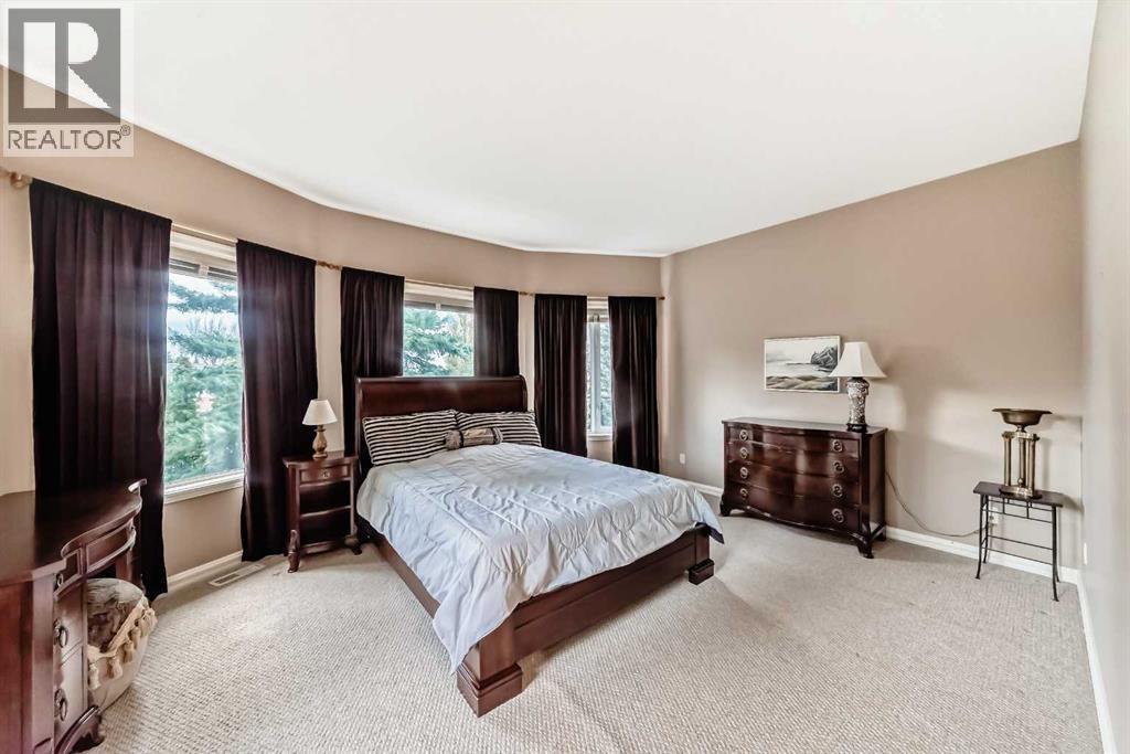 7001 Strathridge Gate Sw, Calgary, Alberta  T3H 4R9 - Photo 17 - A2263140