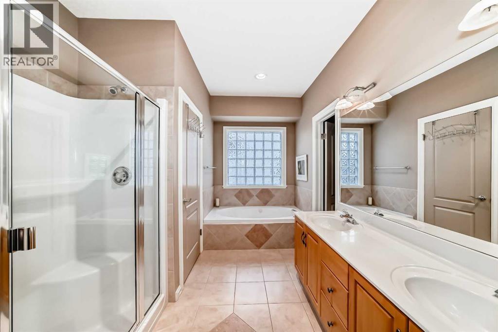 7001 Strathridge Gate Sw, Calgary, Alberta  T3H 4R9 - Photo 19 - A2263140
