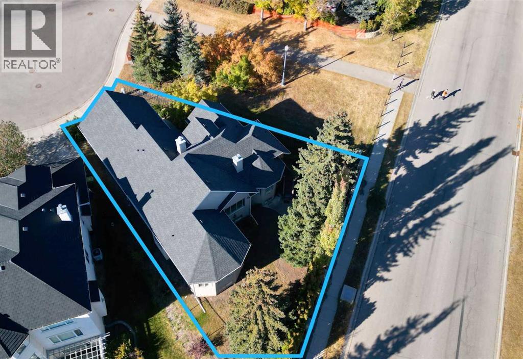 7001 Strathridge Gate Sw, Calgary, Alberta  T3H 4R9 - Photo 2 - A2263140