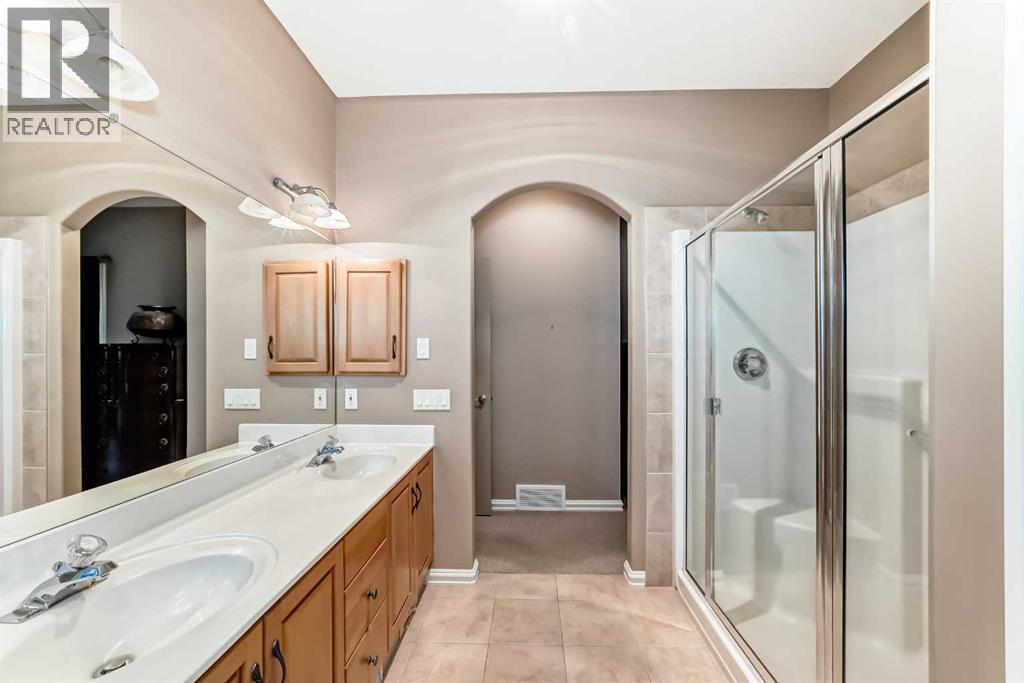 7001 Strathridge Gate Sw, Calgary, Alberta  T3H 4R9 - Photo 21 - A2263140