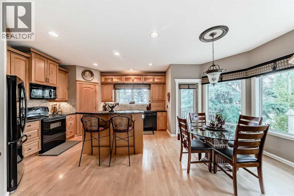7001 Strathridge Gate Sw, Calgary, Alberta  T3H 4R9 - Photo 12 - A2263140