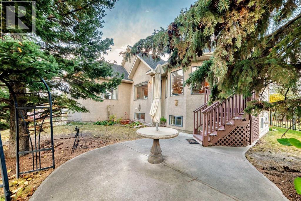 7001 Strathridge Gate Sw, Calgary, Alberta  T3H 4R9 - Photo 36 - A2263140
