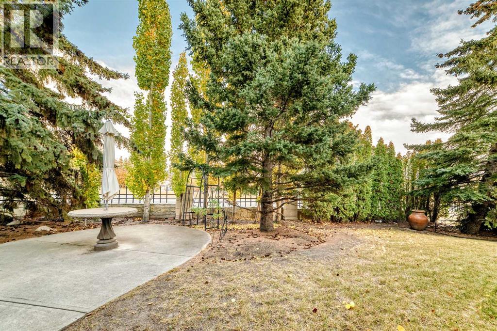 7001 Strathridge Gate Sw, Calgary, Alberta  T3H 4R9 - Photo 37 - A2263140