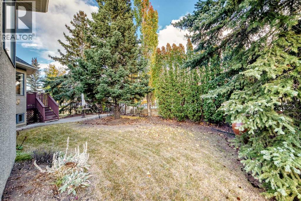 7001 Strathridge Gate Sw, Calgary, Alberta  T3H 4R9 - Photo 39 - A2263140